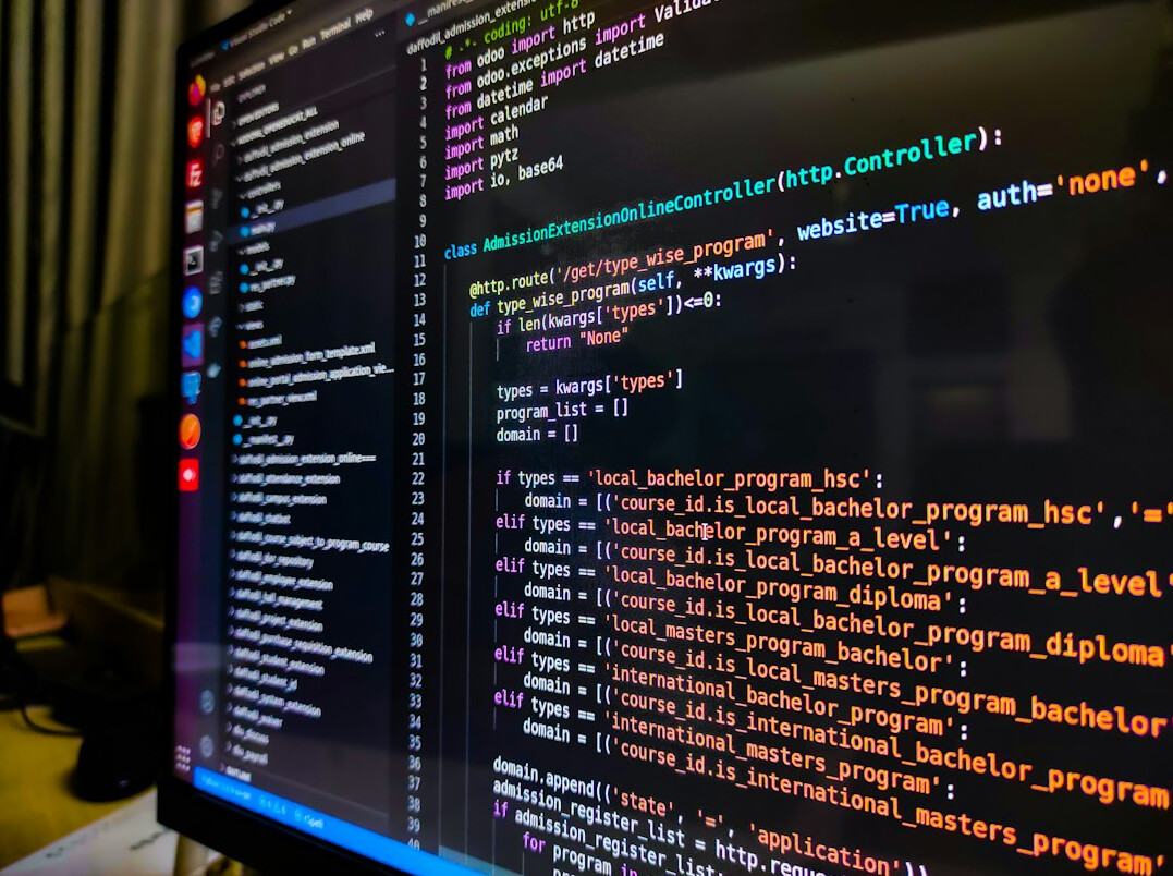 software developer coding insurance app