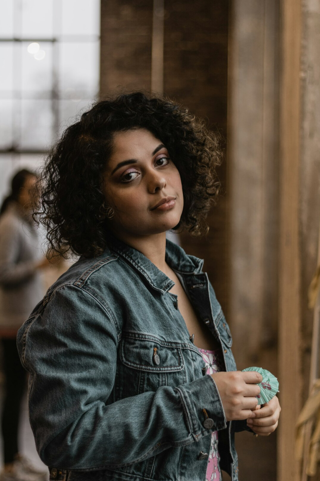Studio portrait of a young Mexican female software product manager