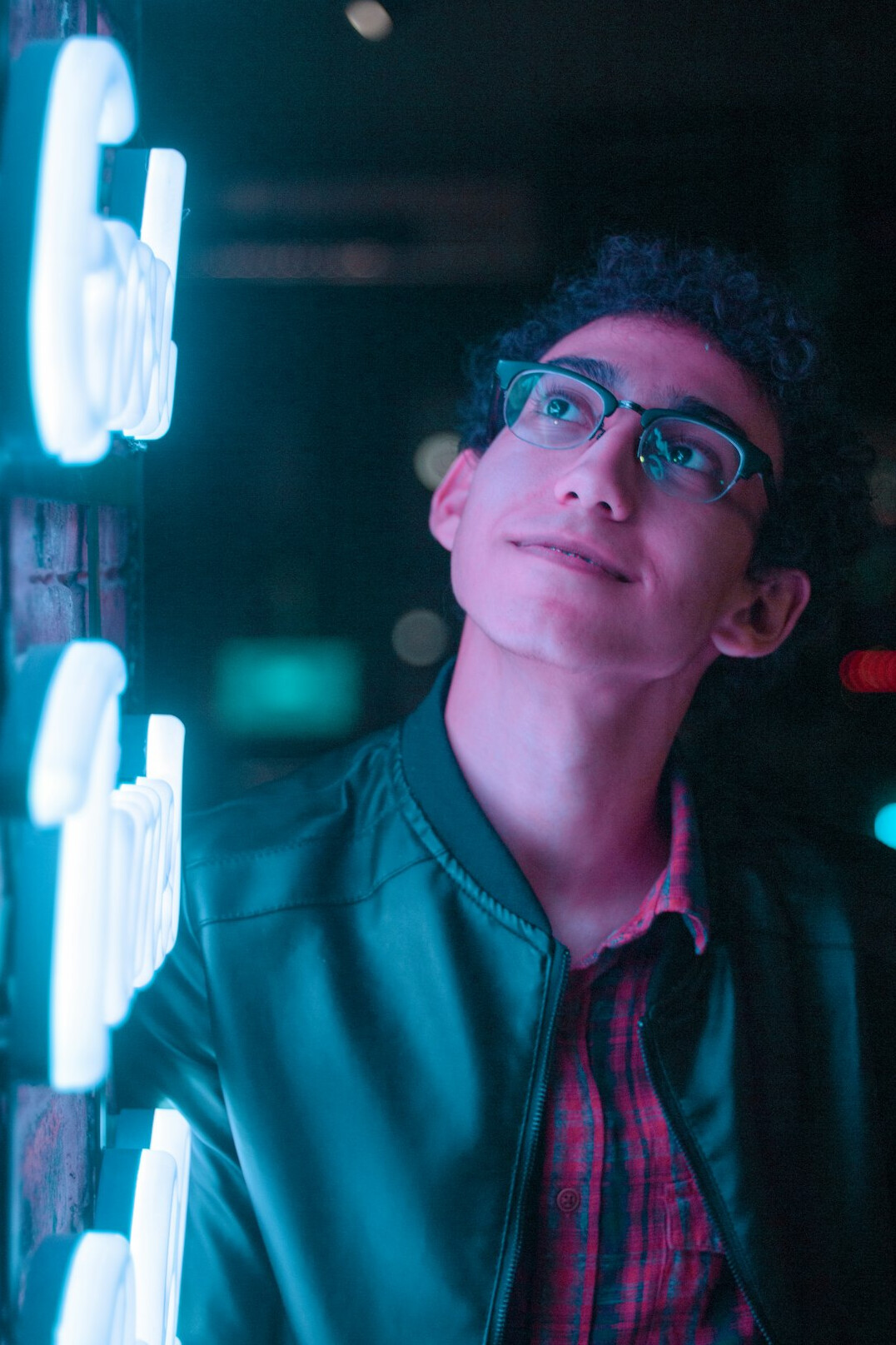 Studio portrait of a young Mexican male software engineer