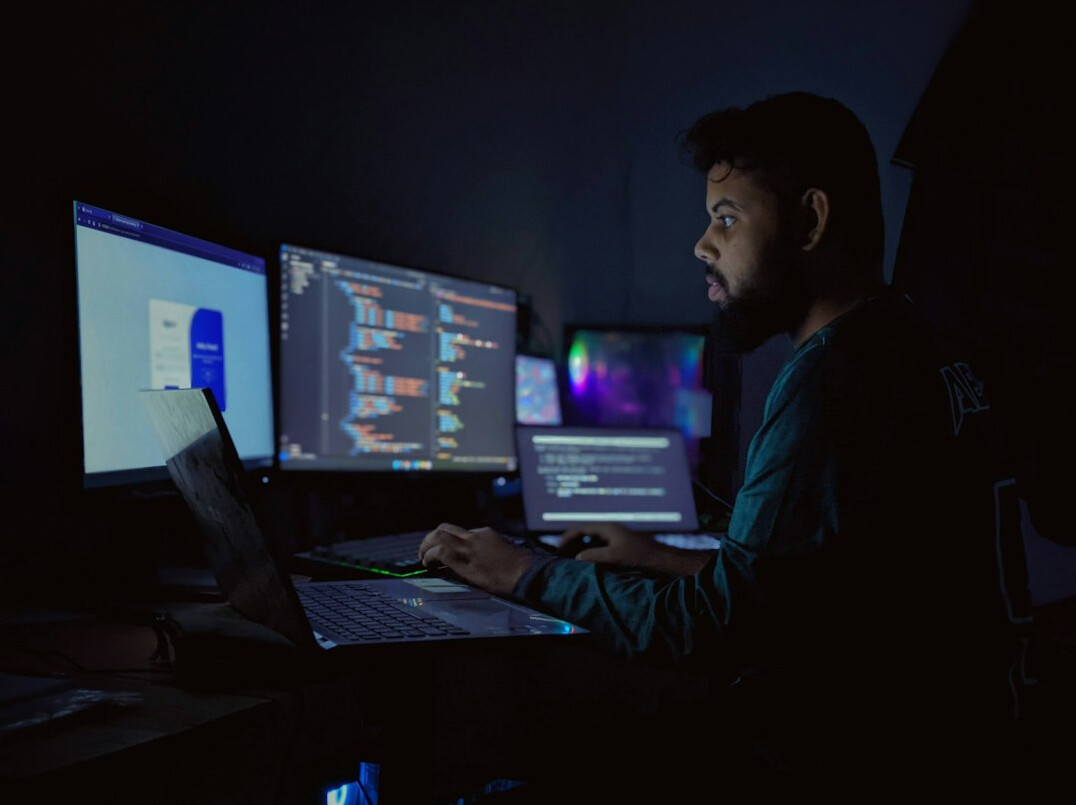 programmer writing insurance code